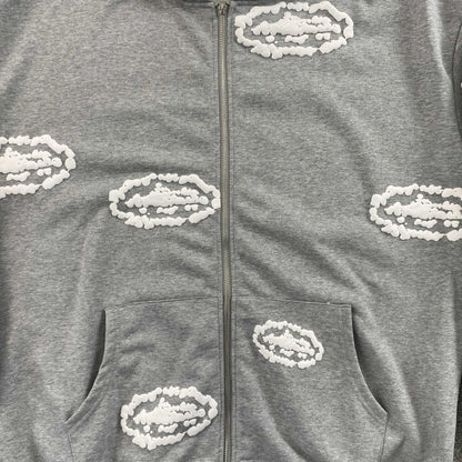 Campera Corteiz x Denim Tears Island Wreath Gris