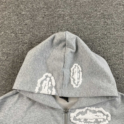 Campera Corteiz x Denim Tears Island Wreath Gris