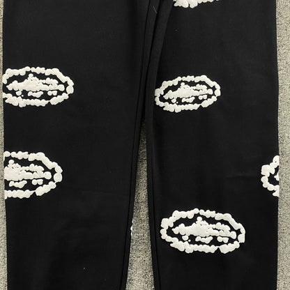 Pantalon Corteiz x Denim Tears Island Wreath Negro