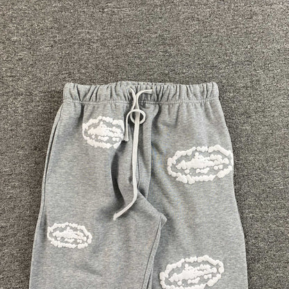 Pantalon Corteiz x Denim Tears Island Wreath Gris