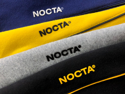 NIKE X DRAKE NOCTA FLEECE PANTS YELLOW