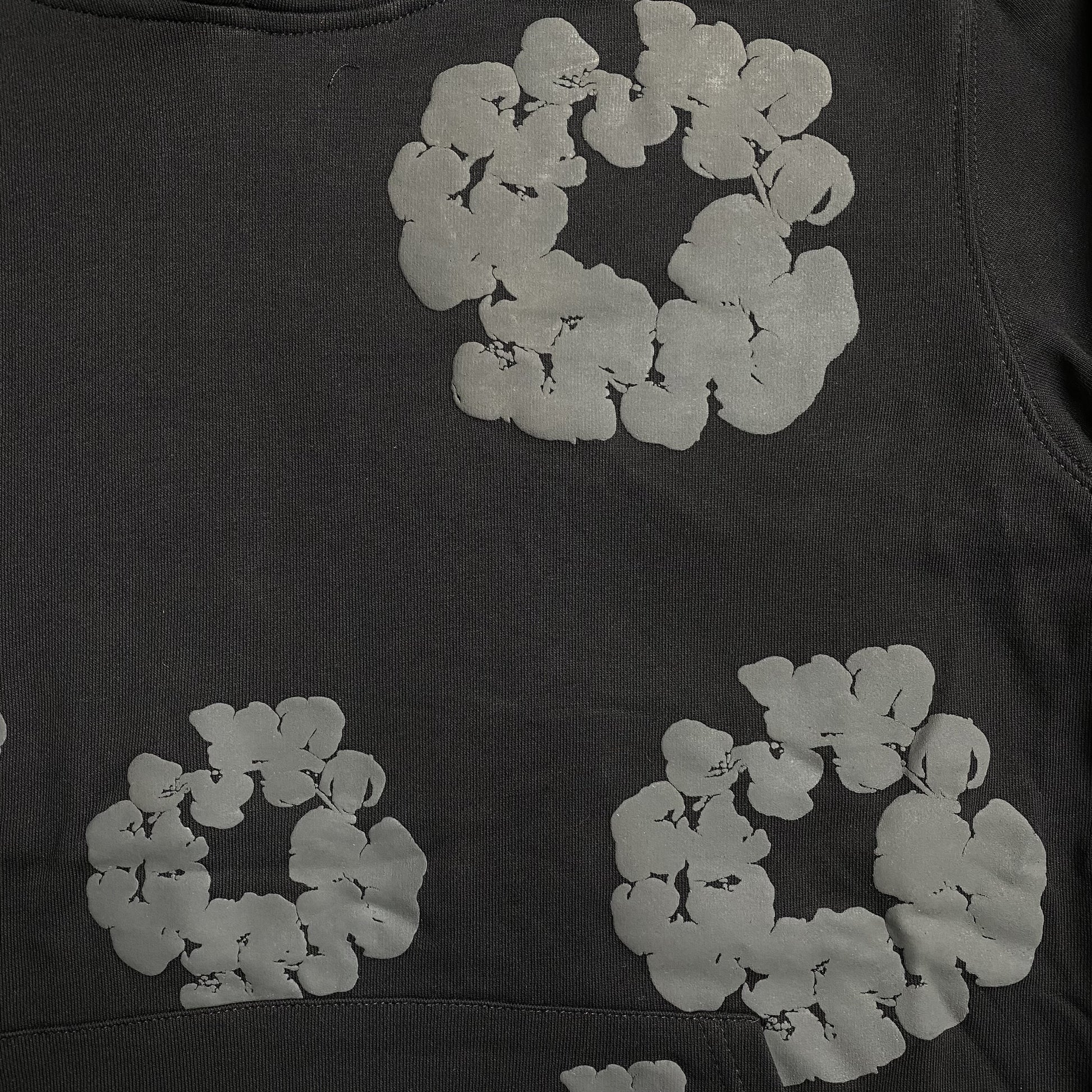 denim-tears-the-cotton-wreath-hoodie-black-monochrome-2-Drip Store Argentina