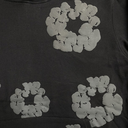 denim-tears-the-cotton-wreath-hoodie-black-monochrome-2-Drip Store Argentina