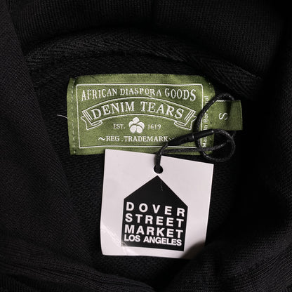 denim-tears-the-cotton-wreath-hoodie-black-monochrome-4-Drip Store Argentina