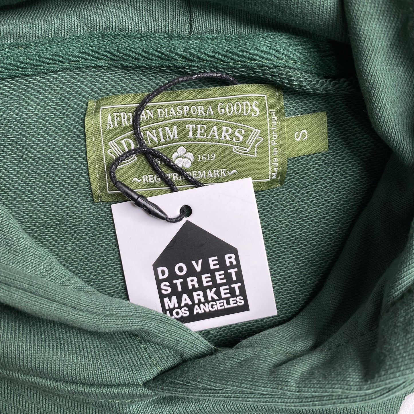 denim-tears-the-cotton-wreath-hoodie-green-4-Drip Store Argentina