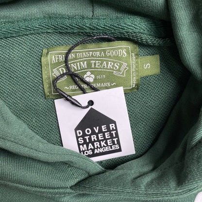 denim-tears-the-cotton-wreath-hoodie-green-4-Drip Store Argentina