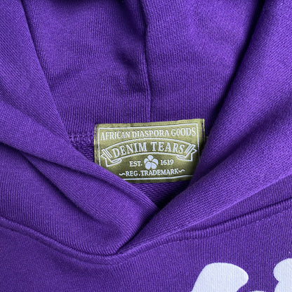 denim-tears-the-cotton-wreath-hoodie-purple-5-Drip Store Argentina