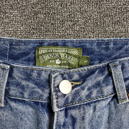 denim-tears-the-cotton-wreath-jean-short-light-blue-8-Drip Store Argentina