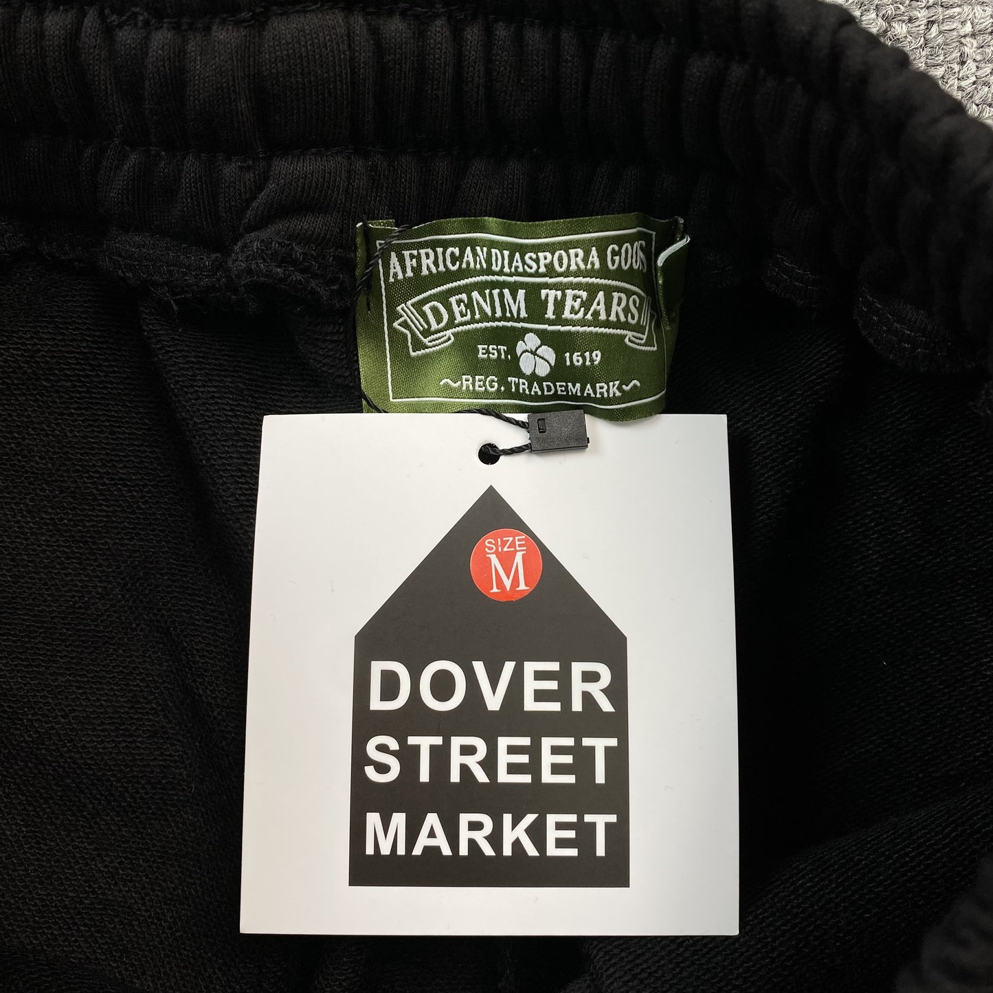 denim-tears-the-cotton-wreath-shorts-black-3-Drip Store Argentina