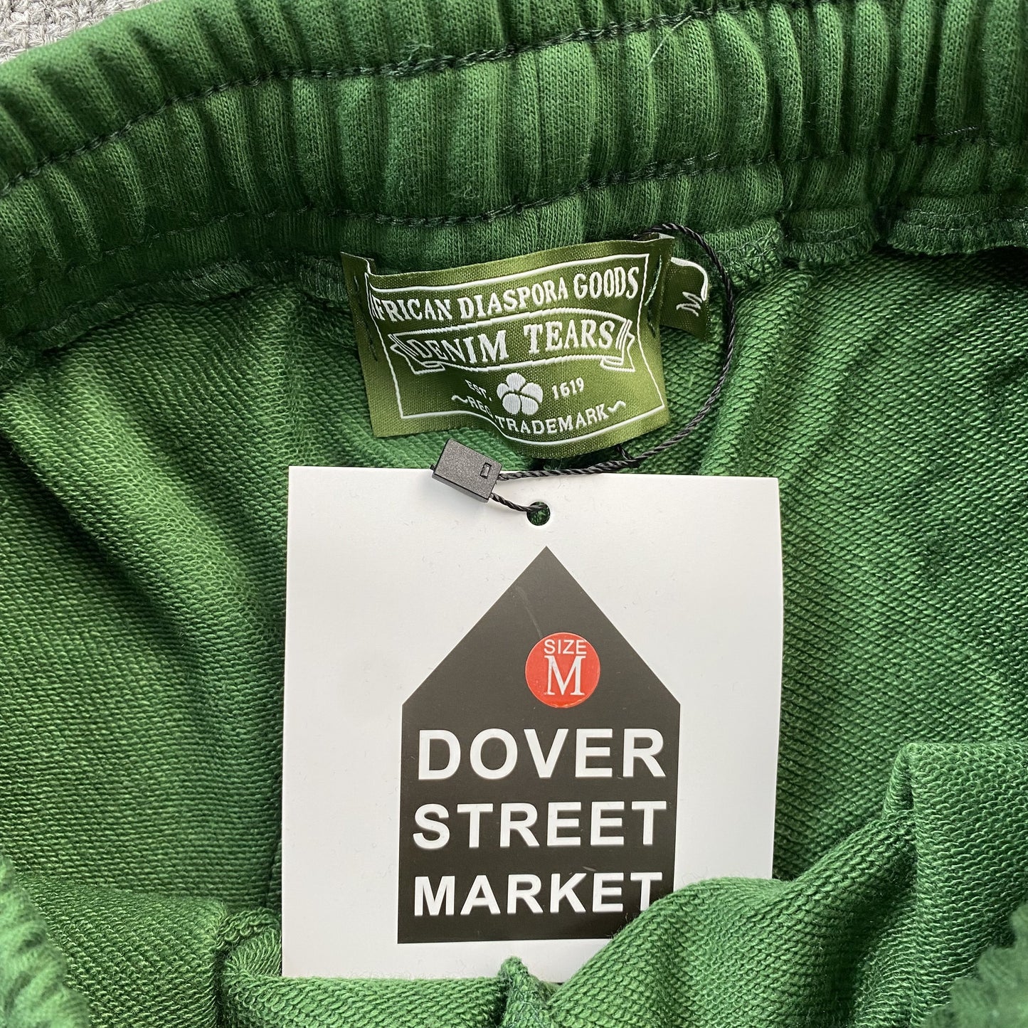 denim-tears-the-cotton-wreath-shorts-green-5-Drip Store Argentina