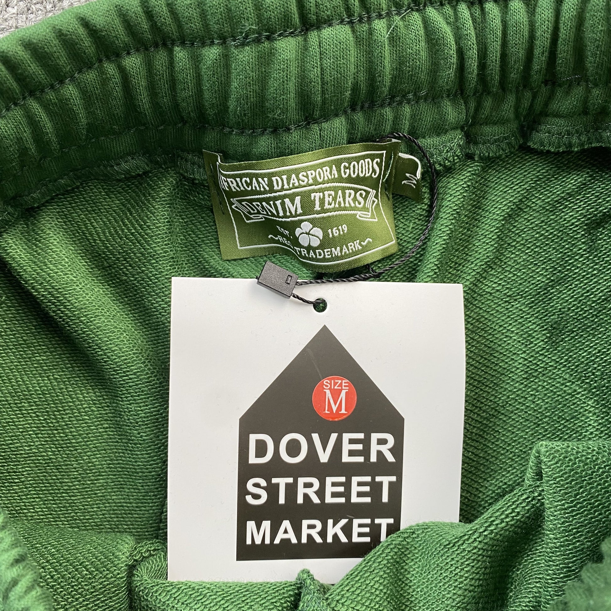 denim-tears-the-cotton-wreath-shorts-green-5-Drip Store Argentina