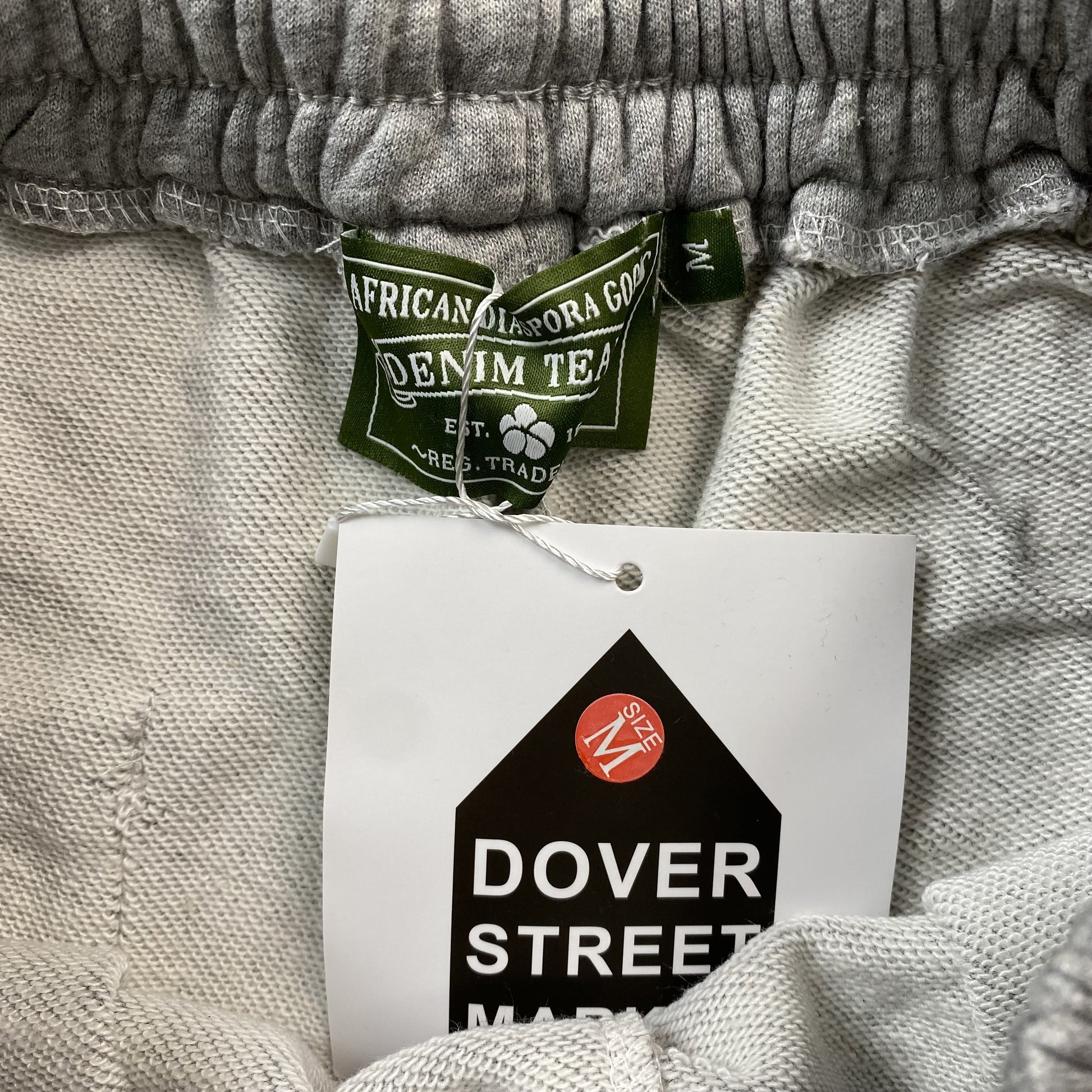 denim-tears-the-cotton-wreath-shorts-grey-7-Drip Store Argentina