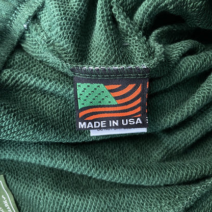 denim-tears-the-cotton-wreath-sweatpants-green-3-Drip Store Argentina