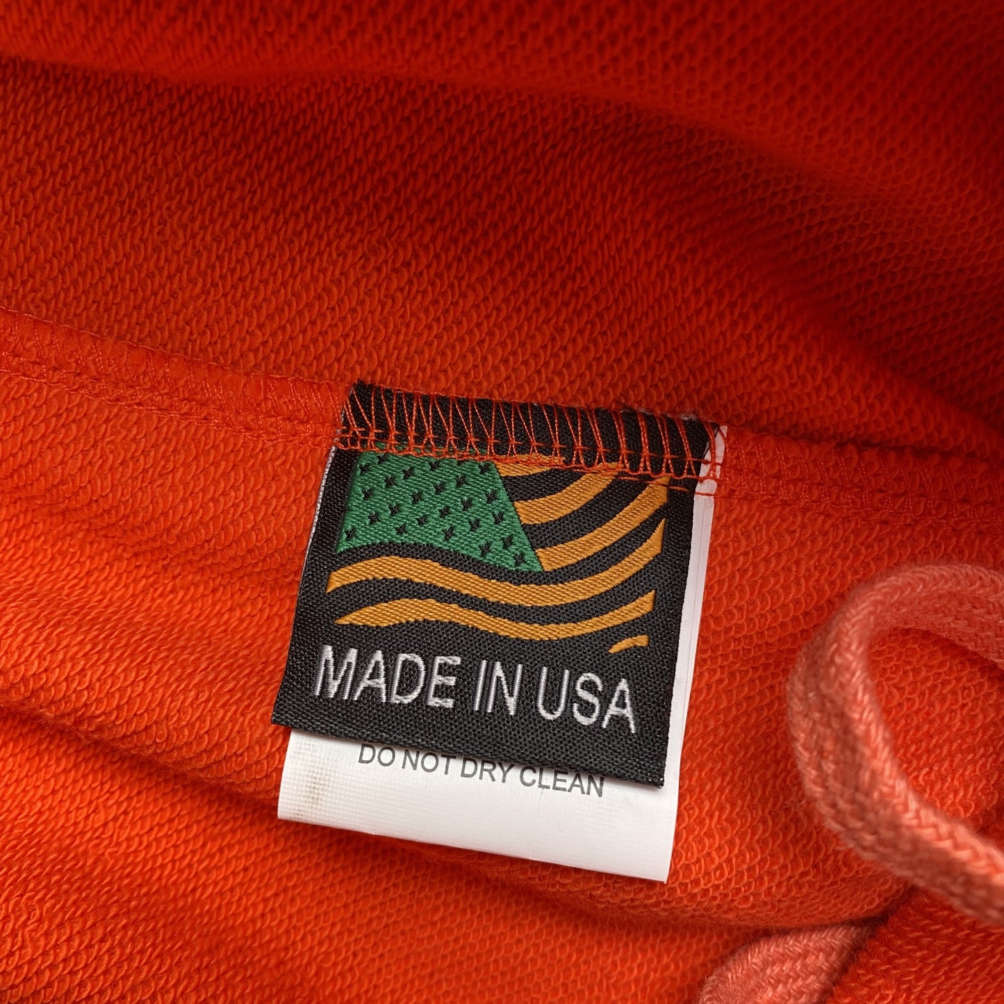 denim-tears-the-cotton-wreath-sweatpants-orange-4-Drip Store Argentina