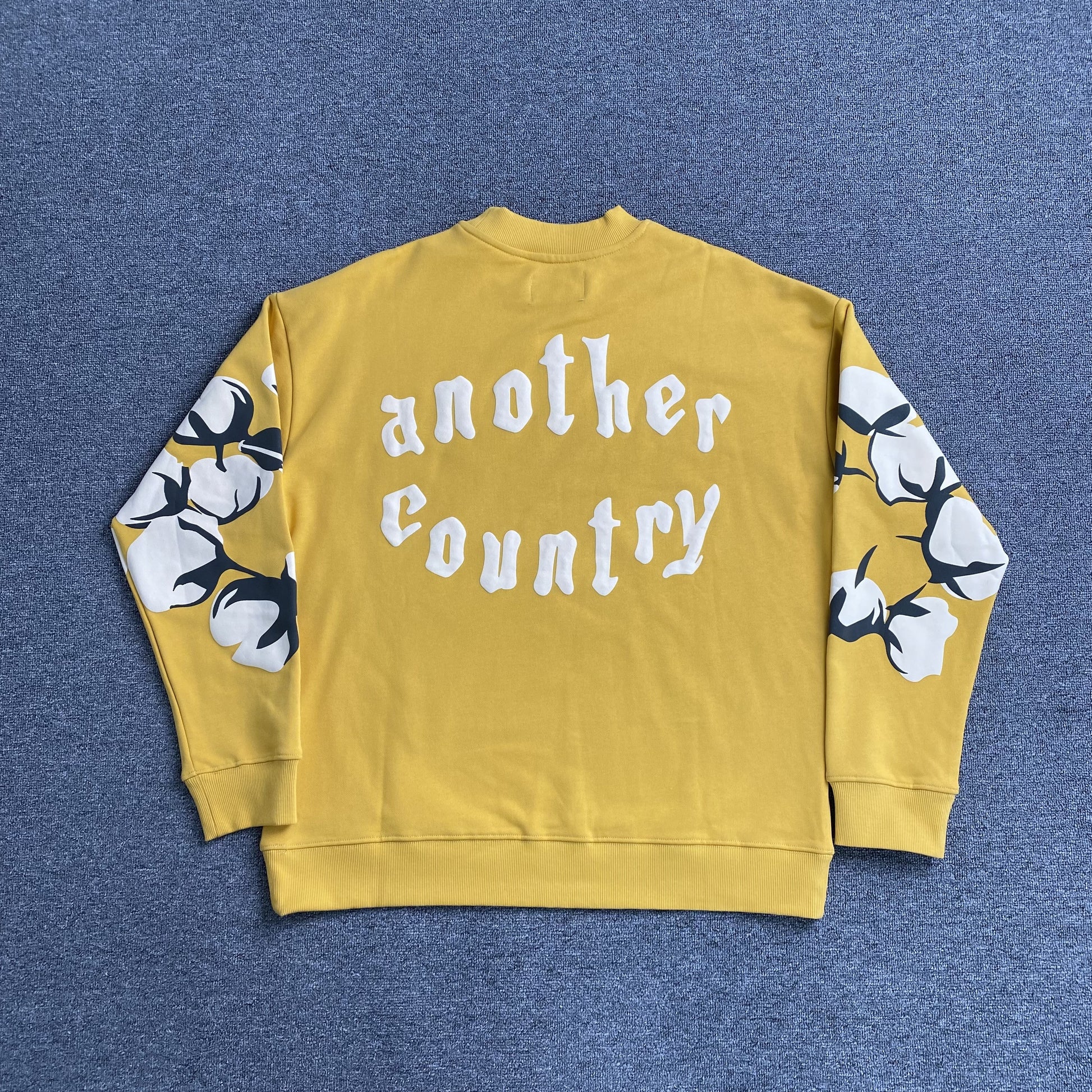 denim-tears-x-cpfm-cactus-tears-crewneck-yellow-2-Drip Store Argentina