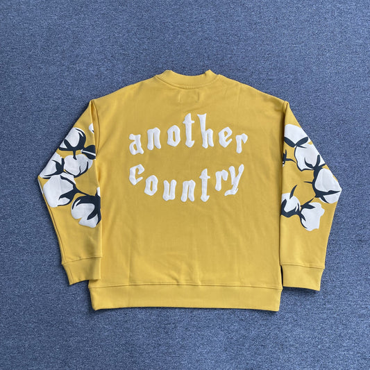 denim-tears-x-cpfm-cactus-tears-crewneck-yellow-2-Drip Store Argentina