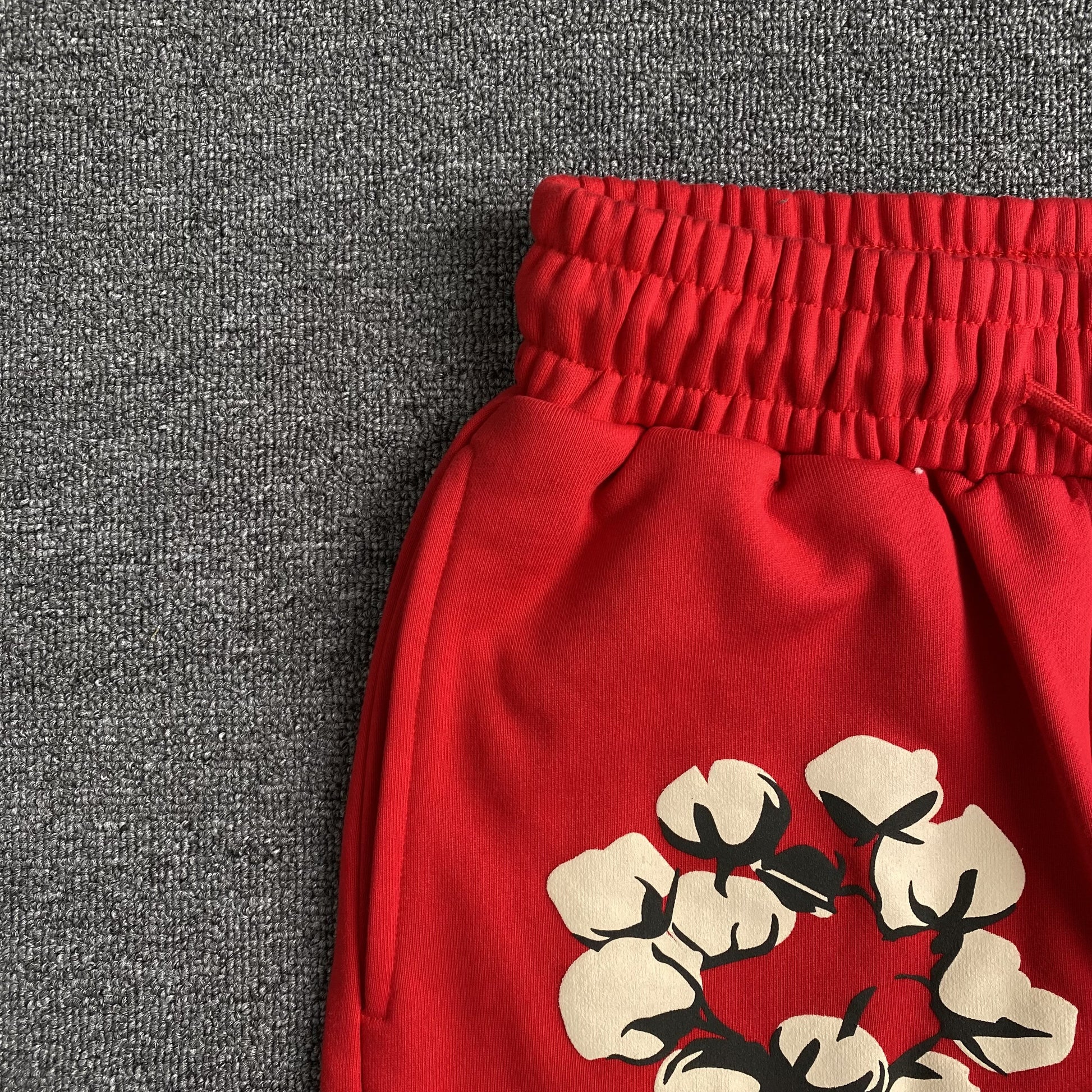 denim-tears-x-cpfm-cactus-tears-wreath-pants-red-4-Drip Store Argentina