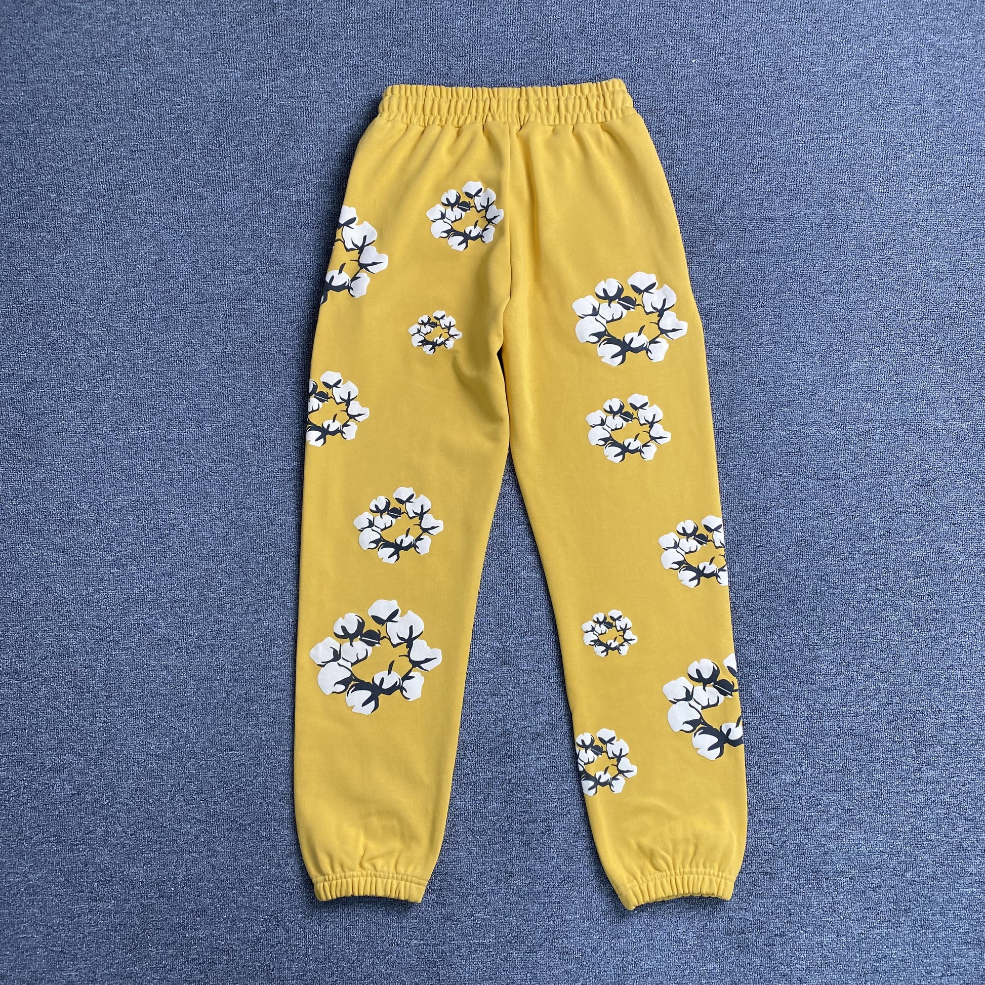 denim-tears-x-cpfm-cactus-tears-wreath-pants-yellow-2-Drip Store Argentina