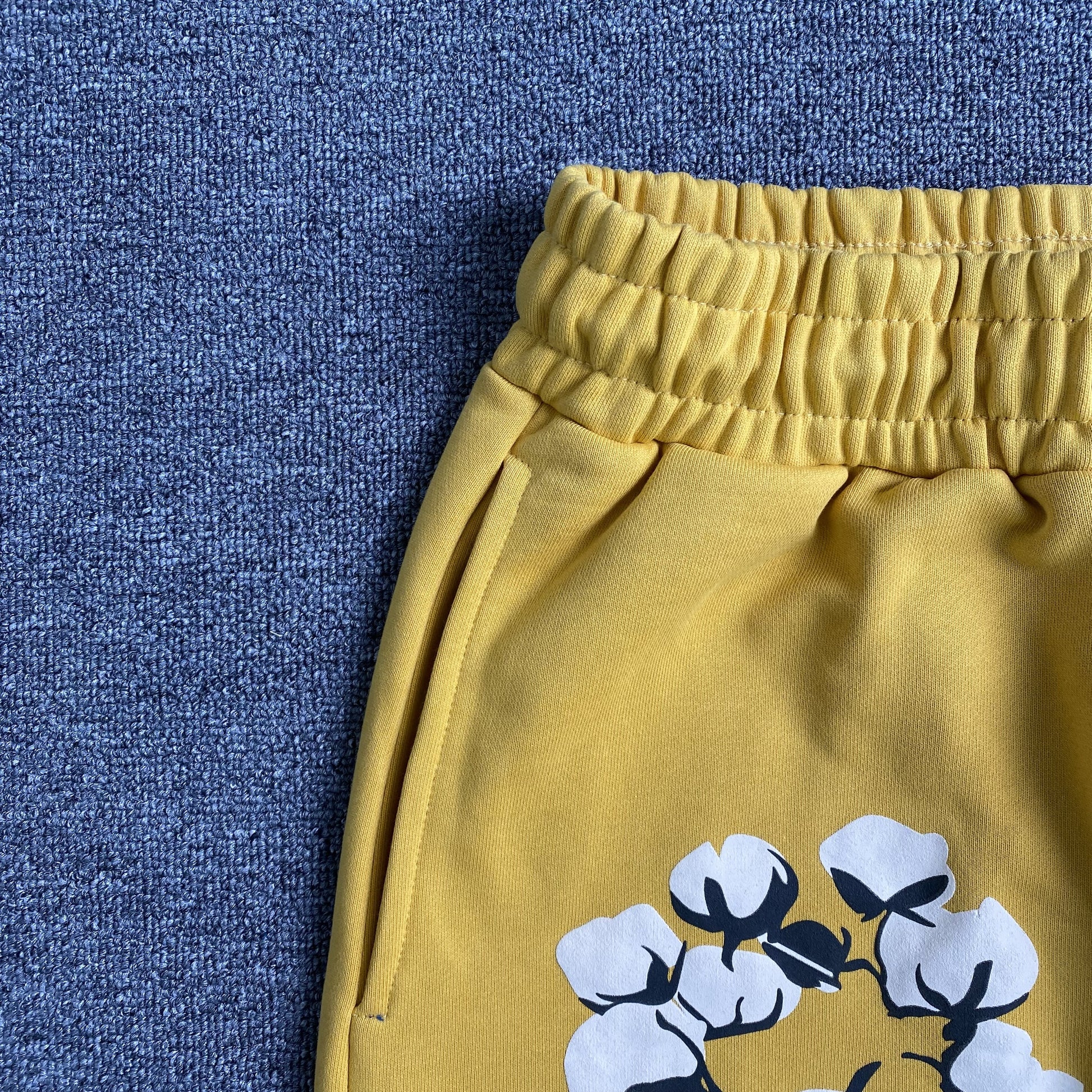 denim-tears-x-cpfm-cactus-tears-wreath-pants-yellow-3-Drip Store Argentina