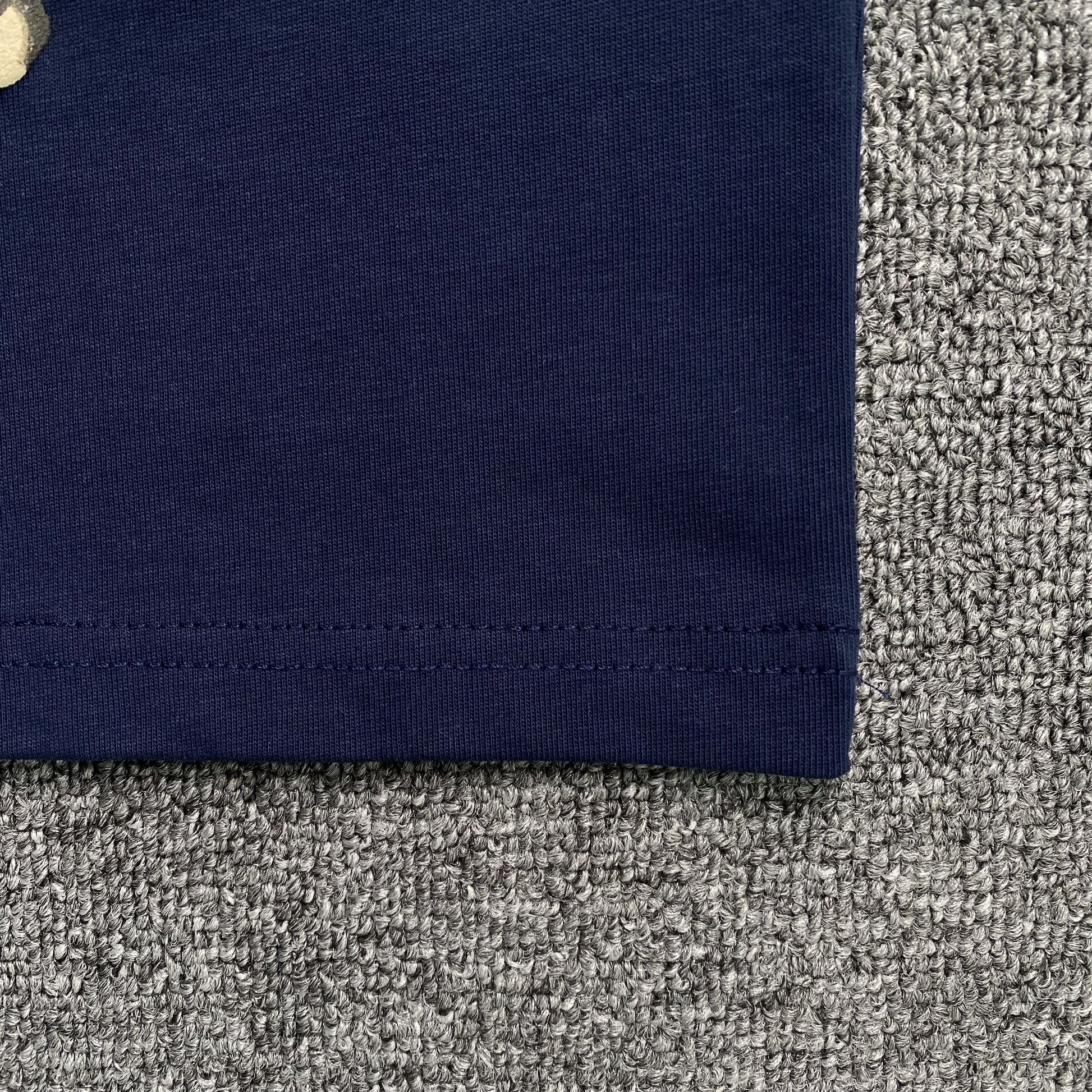 denim-tears-x-cpfm-cactus-tears-wreath-tee-navy-5-Drip Store Argentina