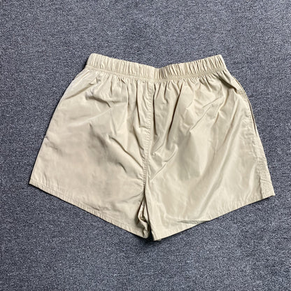 fear-of-god-essentials-running-nylon-short-egg-shell-2-Drip Store Argentina