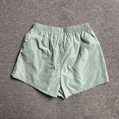 fear-of-god-essentials-running-nylon-short-sycamore-2-Drip Store Argentina
