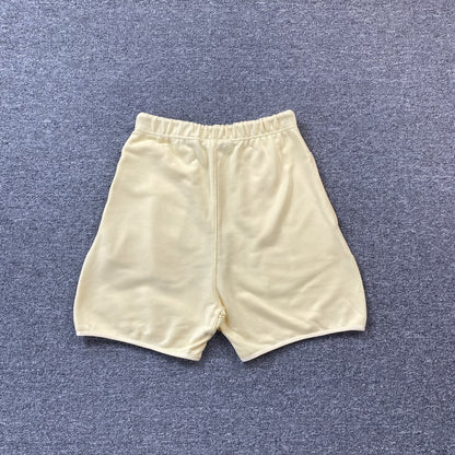 fear-of-god-essentials-shorts-garden-yellow-2-Drip Store Argentina