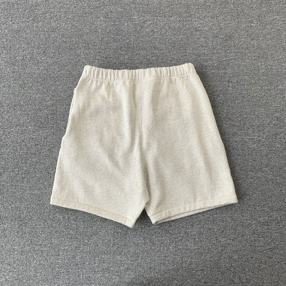 fear-of-god-essentials-shorts-ss22-light-oatmeal-2-Drip Store Argentina