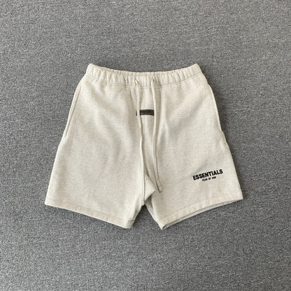 fear-of-god-essentials-shorts-ss22-light-oatmeal-Drip Store Argentina