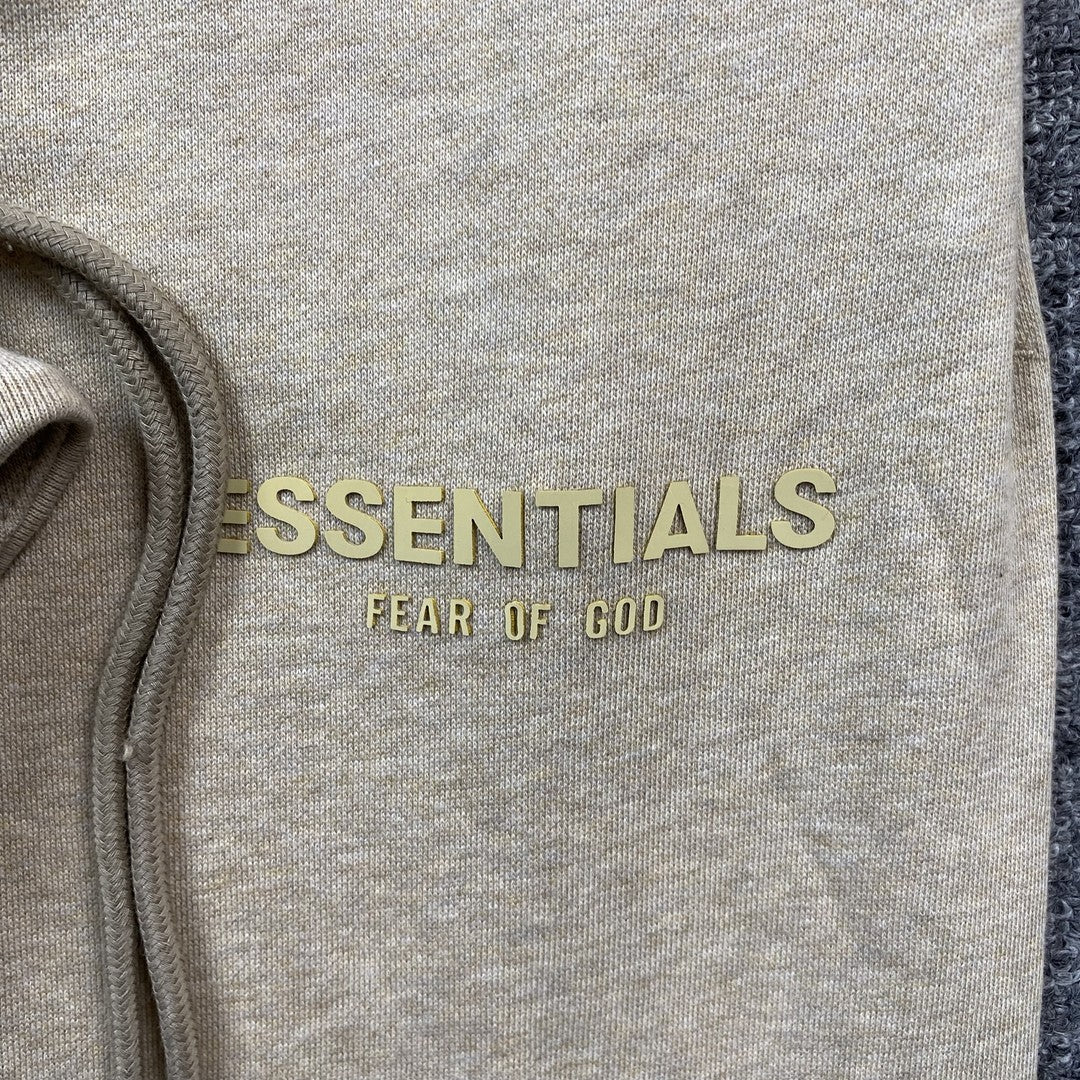 Pantalón Fear of God Essentials Small Logo Gold Heather