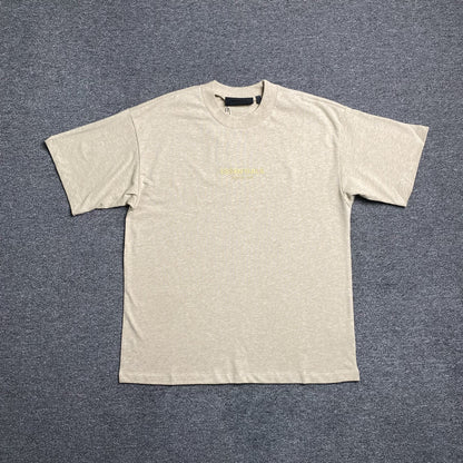 Remera Fear of God Essentials Small Logo Gold Heather