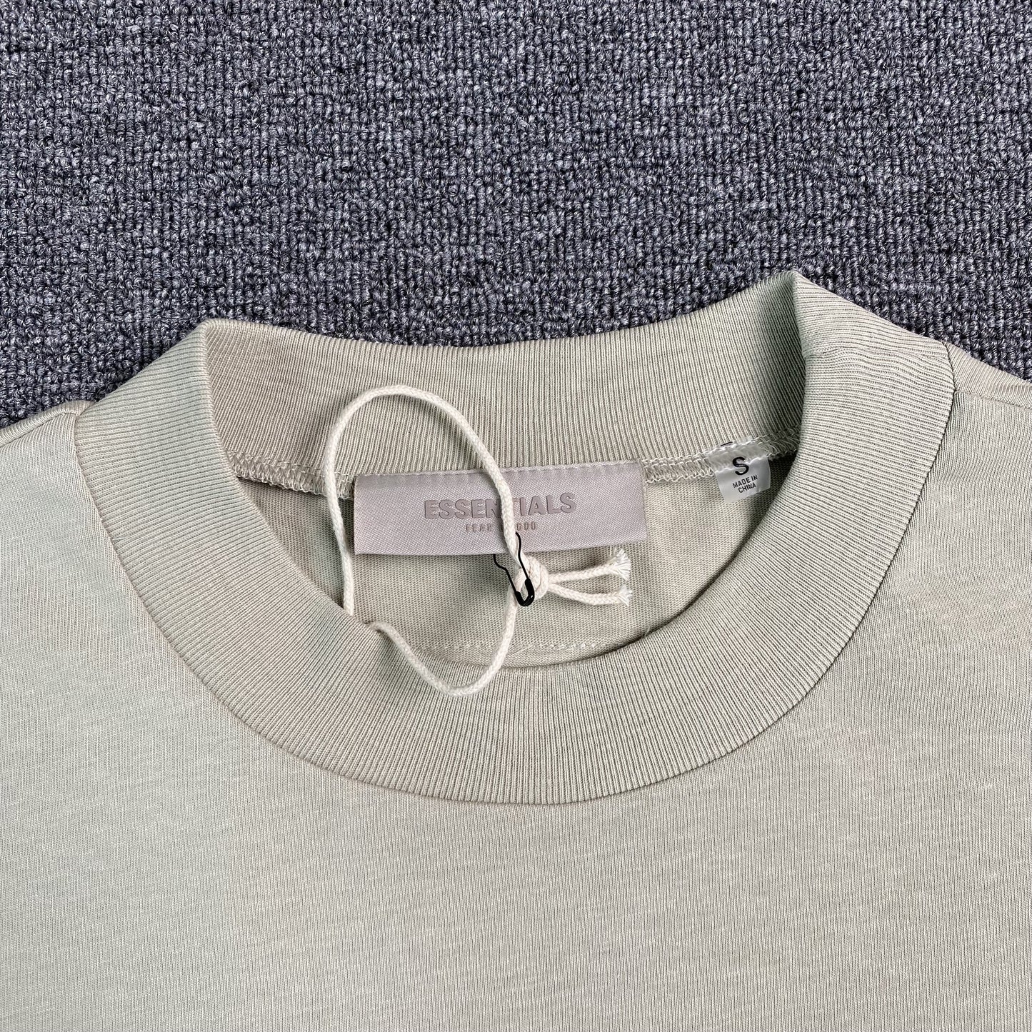 Remera Fear of God Essentials Seafoam