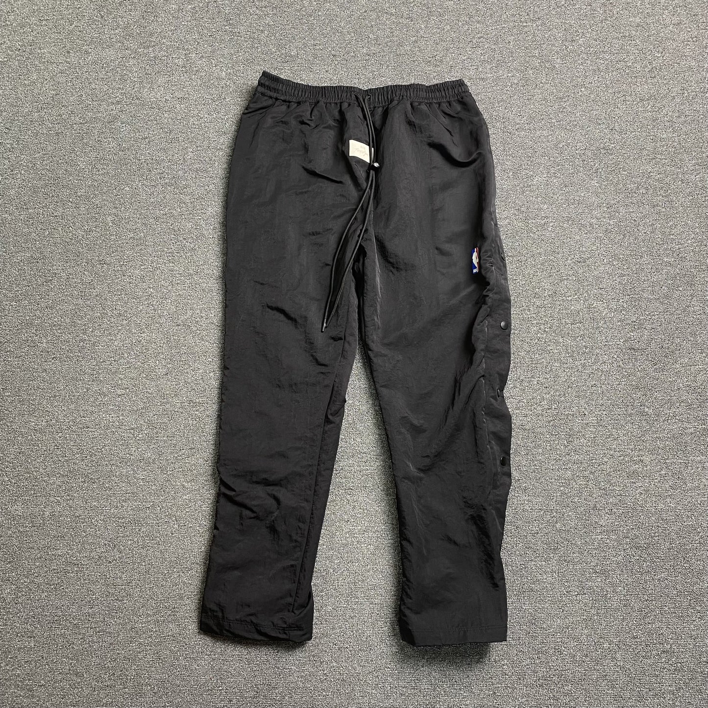 Pantalón Fear of God X Nike Nylon Negro
