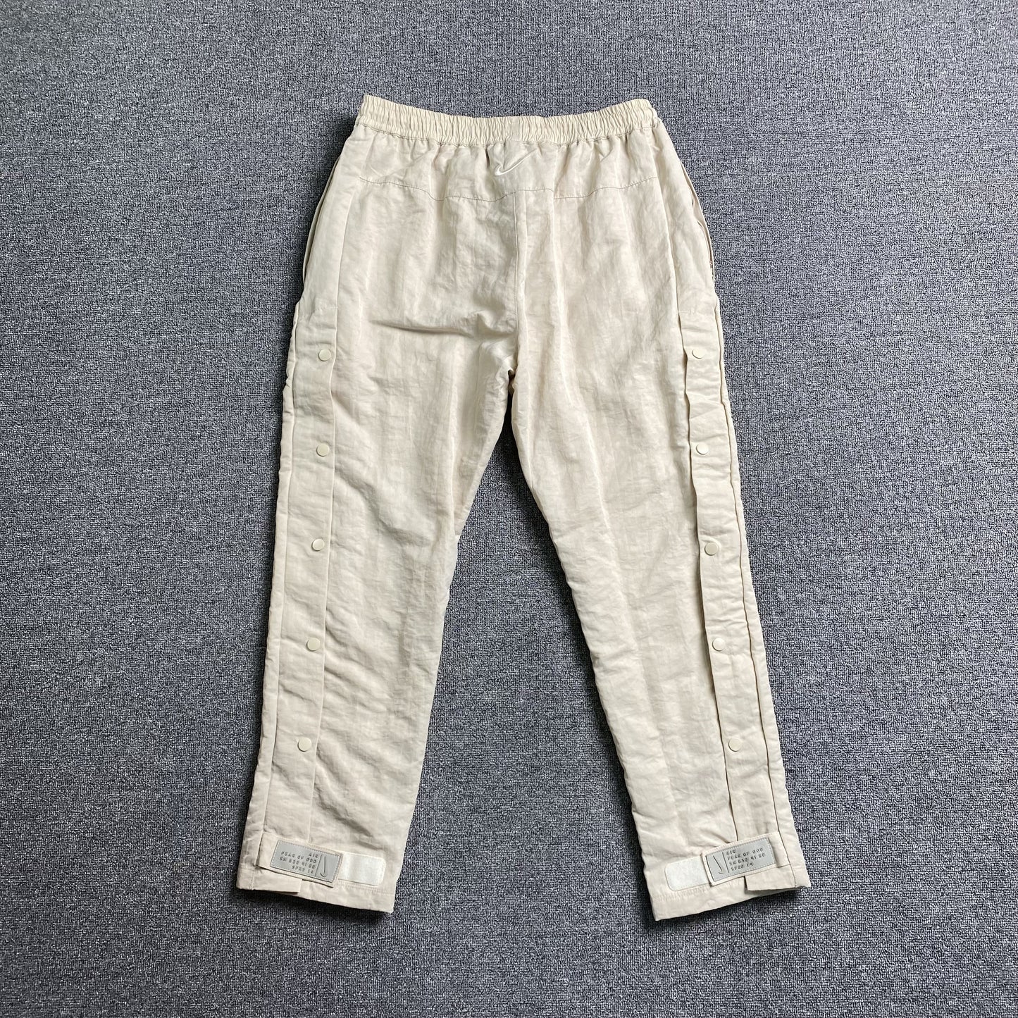 Pantalón Fear of God X Nike Nylon Crema