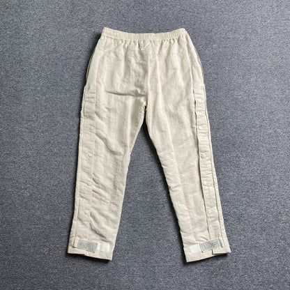 Pantalón Fear of God X Nike Nylon Crema