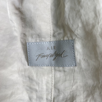 Pantalón Fear of God X Nike Nylon Crema