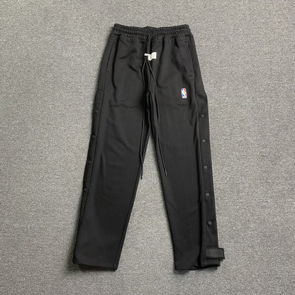 Pantalón Fear of God X Nike Tear Away Negro