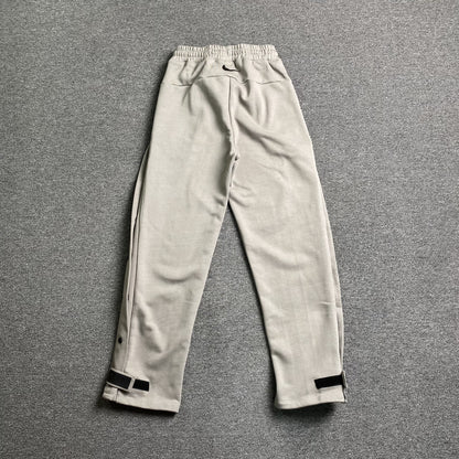 Pantalón Fear of God X Nike Tear Away Gris