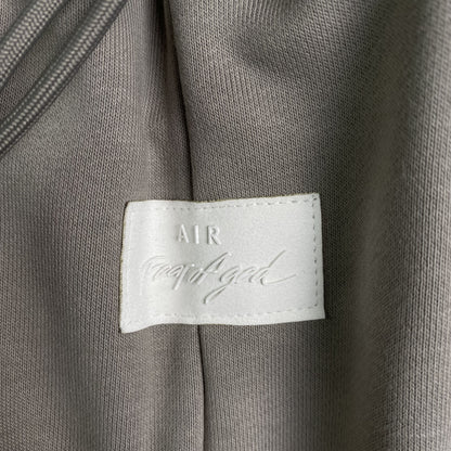 Pantalón Fear of God X Nike Tear Away Gris