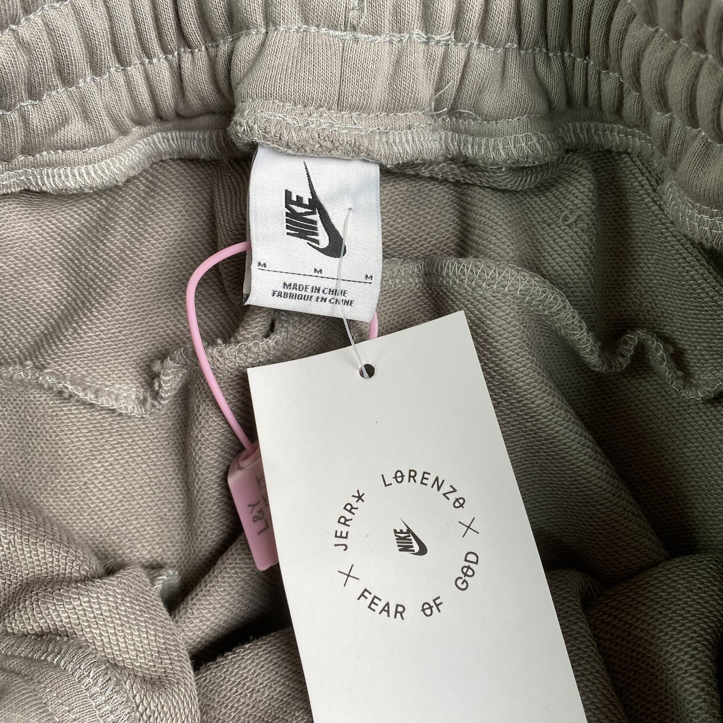 Pantalón Fear of God X Nike Tear Away Gris