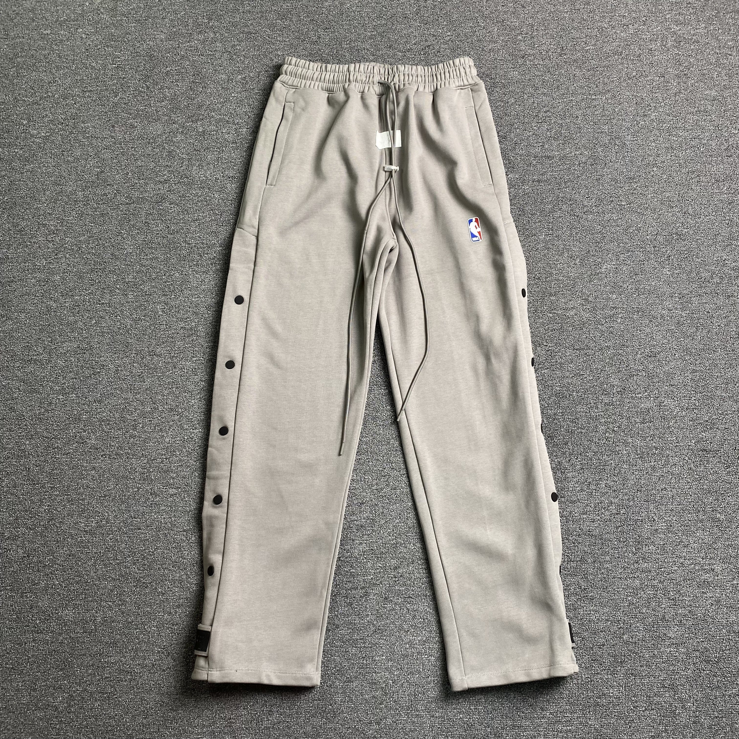 Pantalón Fear of God X Nike Tear Away Gris - Drip Store Argentina