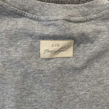 Remera Fear of God x Nike Warm Up Grey