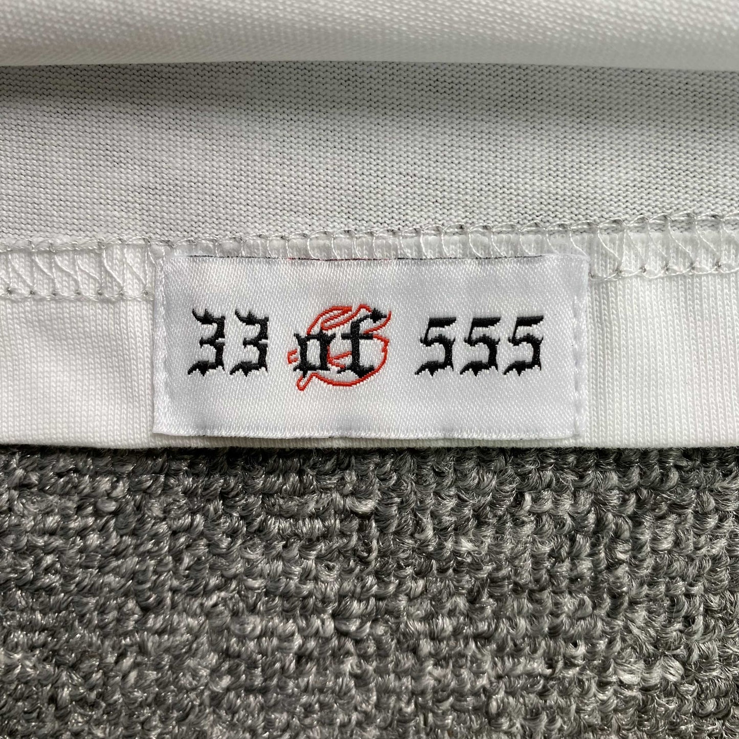 Remera Godspeed F1 Finishline Blanca