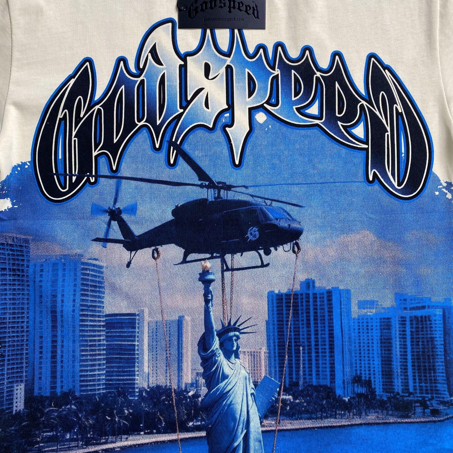 Remera Godspeed Memento Vivere Crema