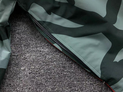 kaws-x-the-north-face-retro-1986-mountain-jacket-balsam-green-86-11-Drip Store Argentina