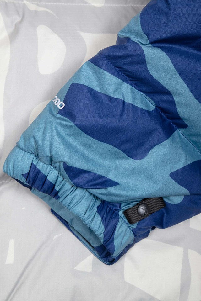 kaws-x-the-north-face-retro-1996-nuptse-jacket-moonlight-ivory-9_276e103d-Drip Store Argentina