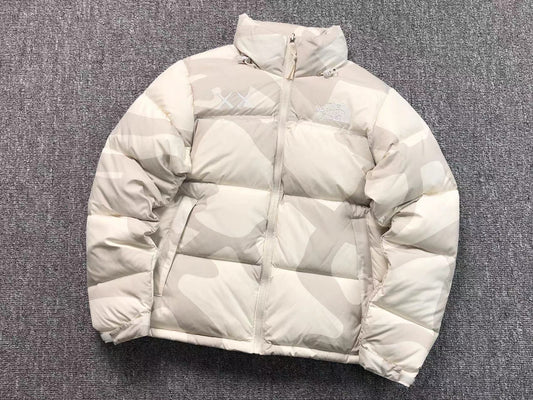kaws-x-the-north-face-retro-1996-nuptse-jacket-moonlight-ivory-Drip Store Argentina
