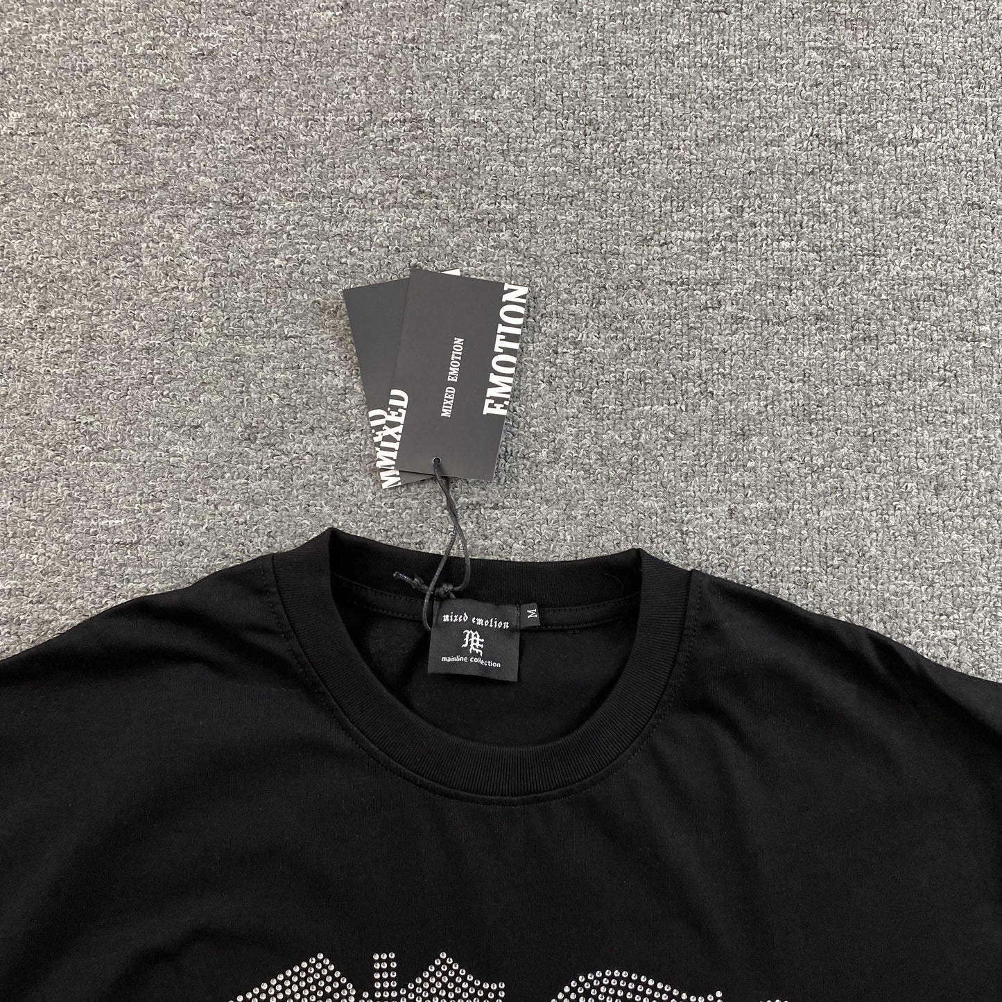 Remera Mixed Emotion Angel Rhinestone Negra