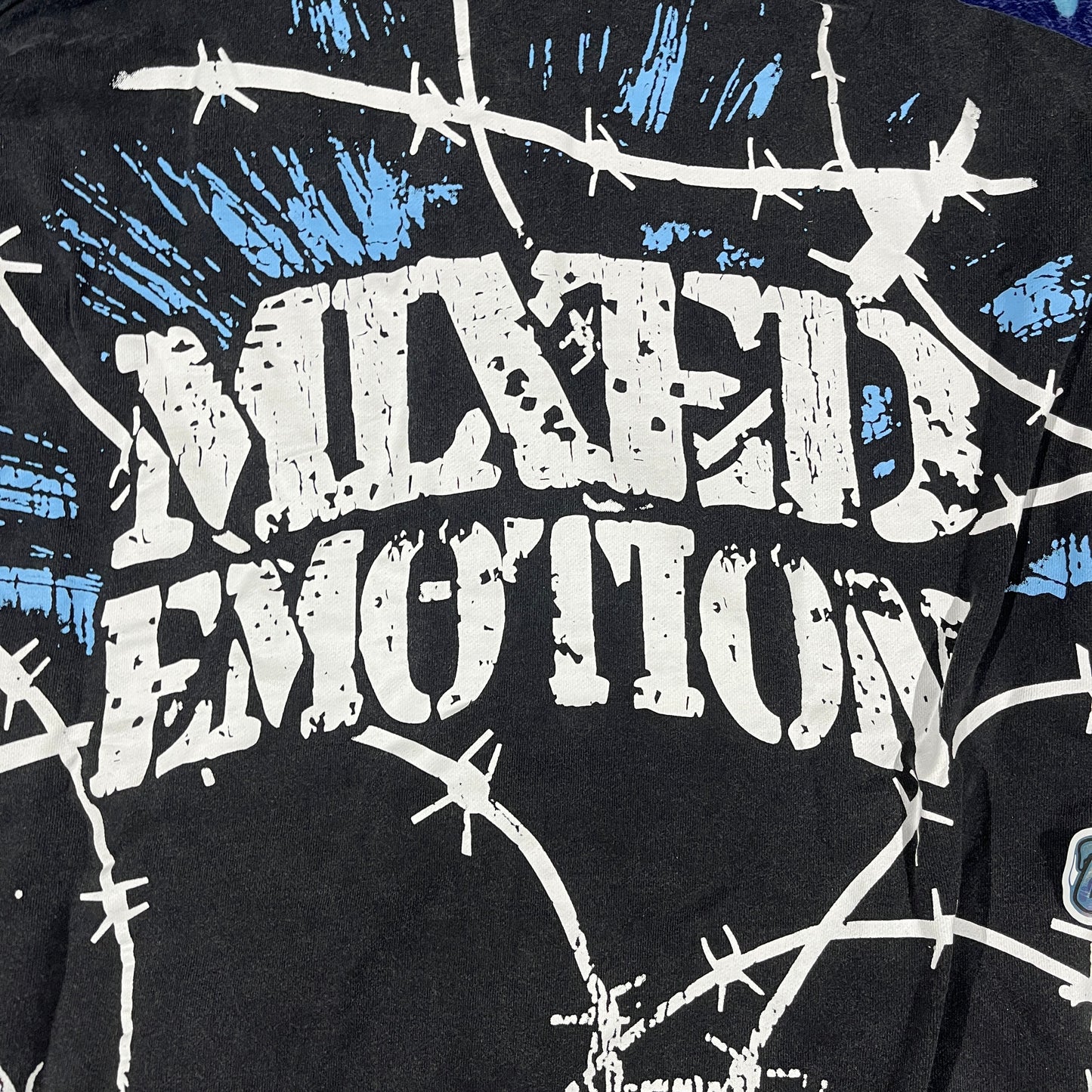 Campera Mixed Emotion Radioactive Black