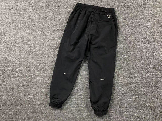 nike-x-drake-nocta-track-pants-black-2_f949ed33-Drip Store Argentina